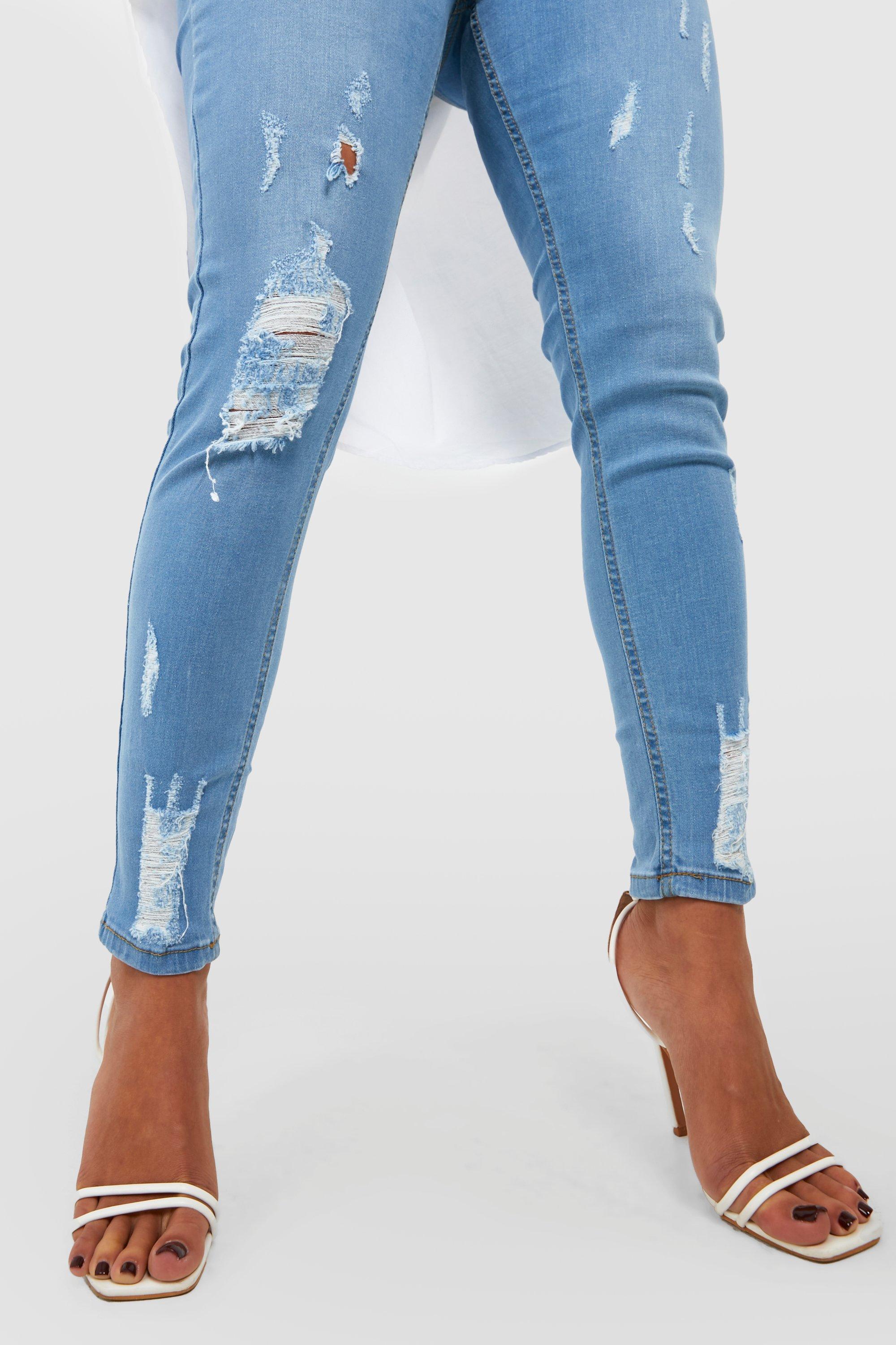 Skinny jeans with store rips